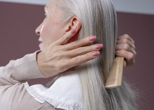 Woman combing her hair